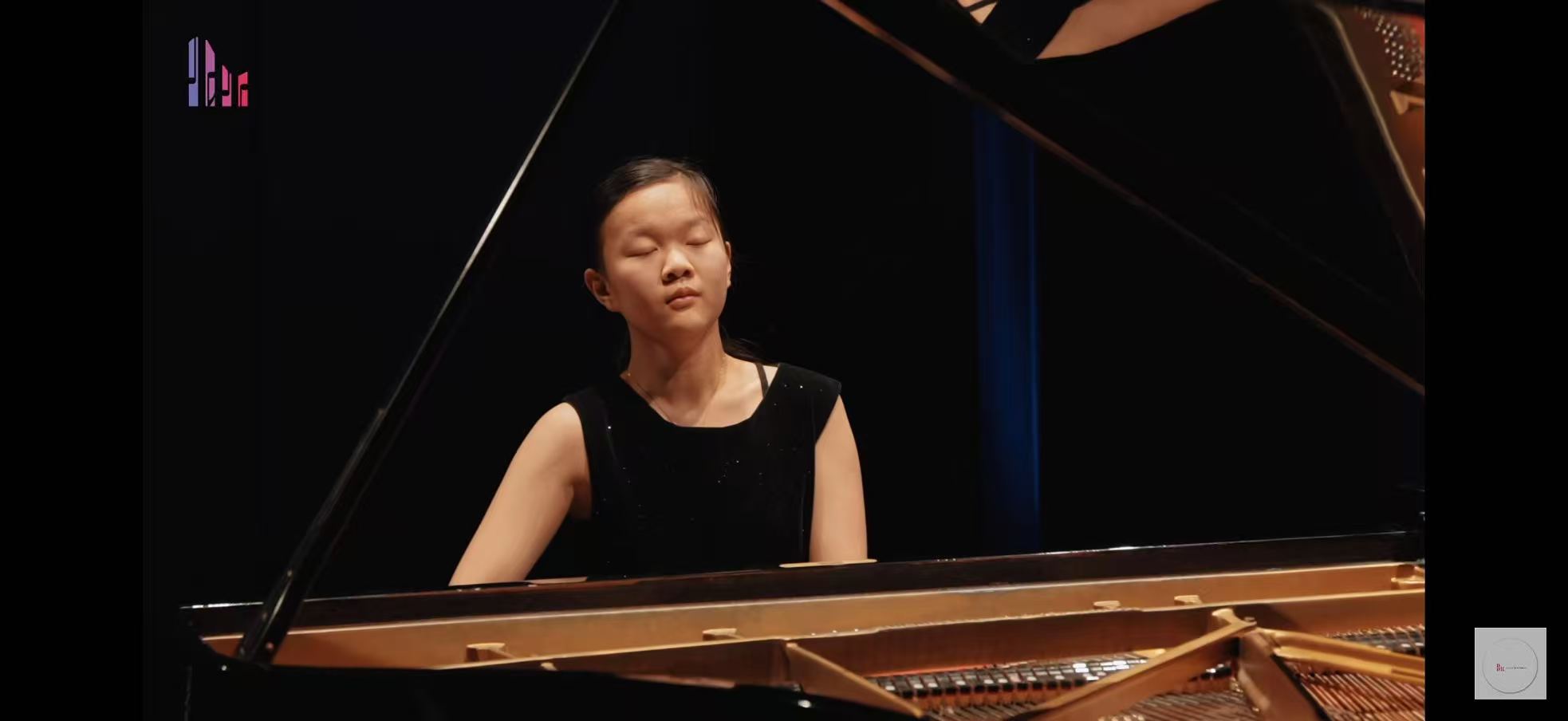 Angela performing on stage